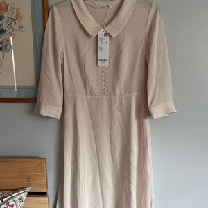 Chic Cream Long Sleeve Dress with Button Accents